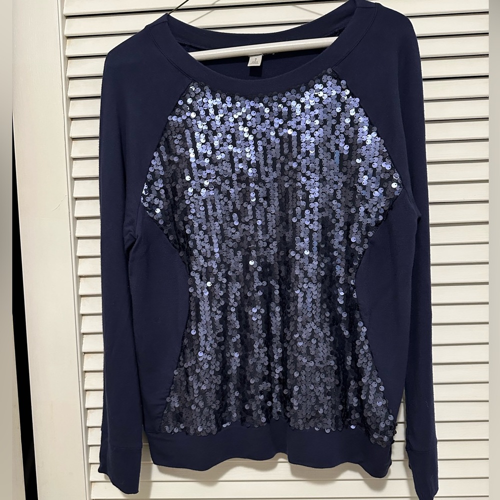 Sequins top with long sleeves.